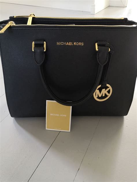 michael kors laukku käytetty